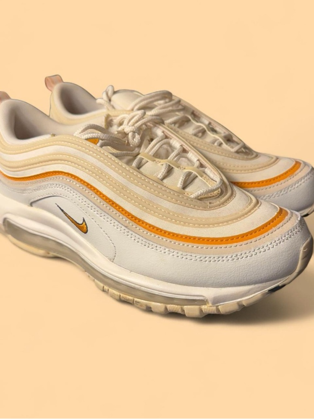 Nike Women’s Air Max 97 in Cream and Orange